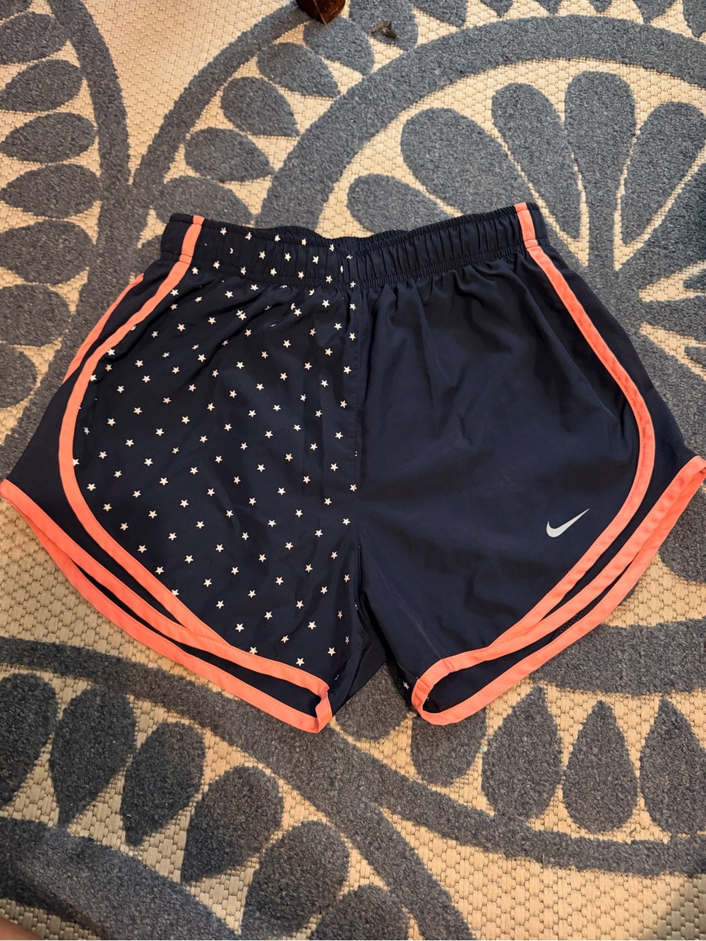 Nike Navy Women's Athletic Shorts with Coral Trim and Star Pattern